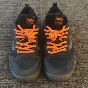 Vans Black and Orange Sneakers with Vibrant Laces
